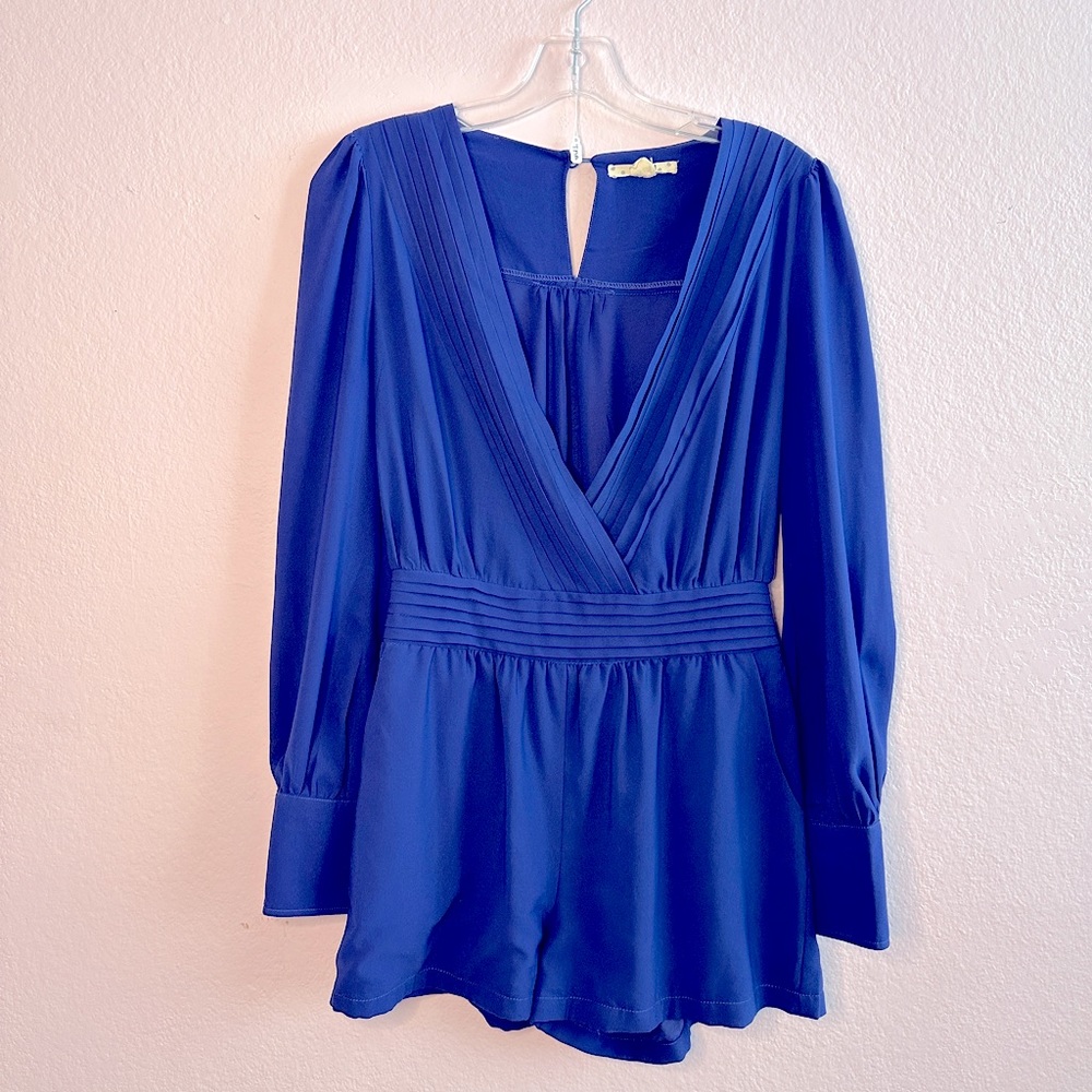 Cobalt blue, one-piece romper.